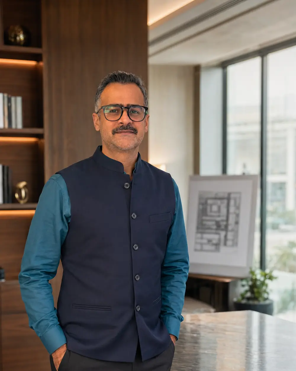Suhail Bhatia in a professional executive office setting